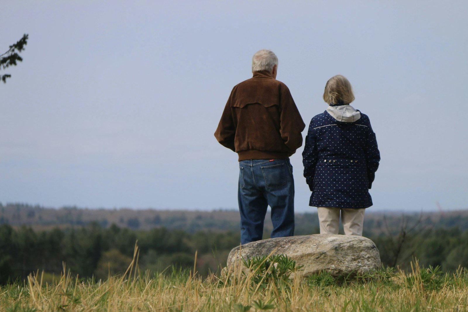 Older couple looking out over the countryside
