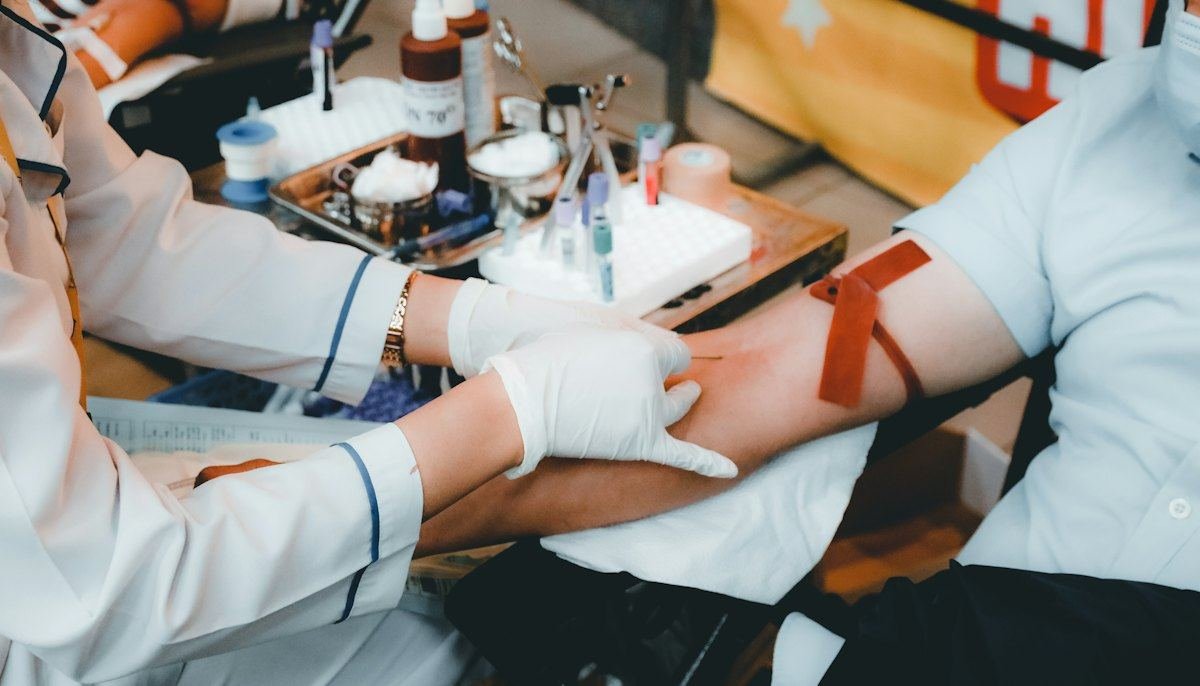 Blood sample being drawn by a clinician